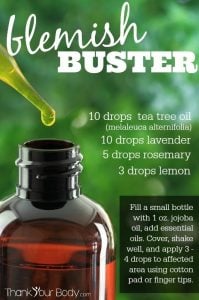 Dropper over essential oil bottle